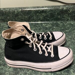 Converse All Stars Black and White High-Tops. In very good shape.